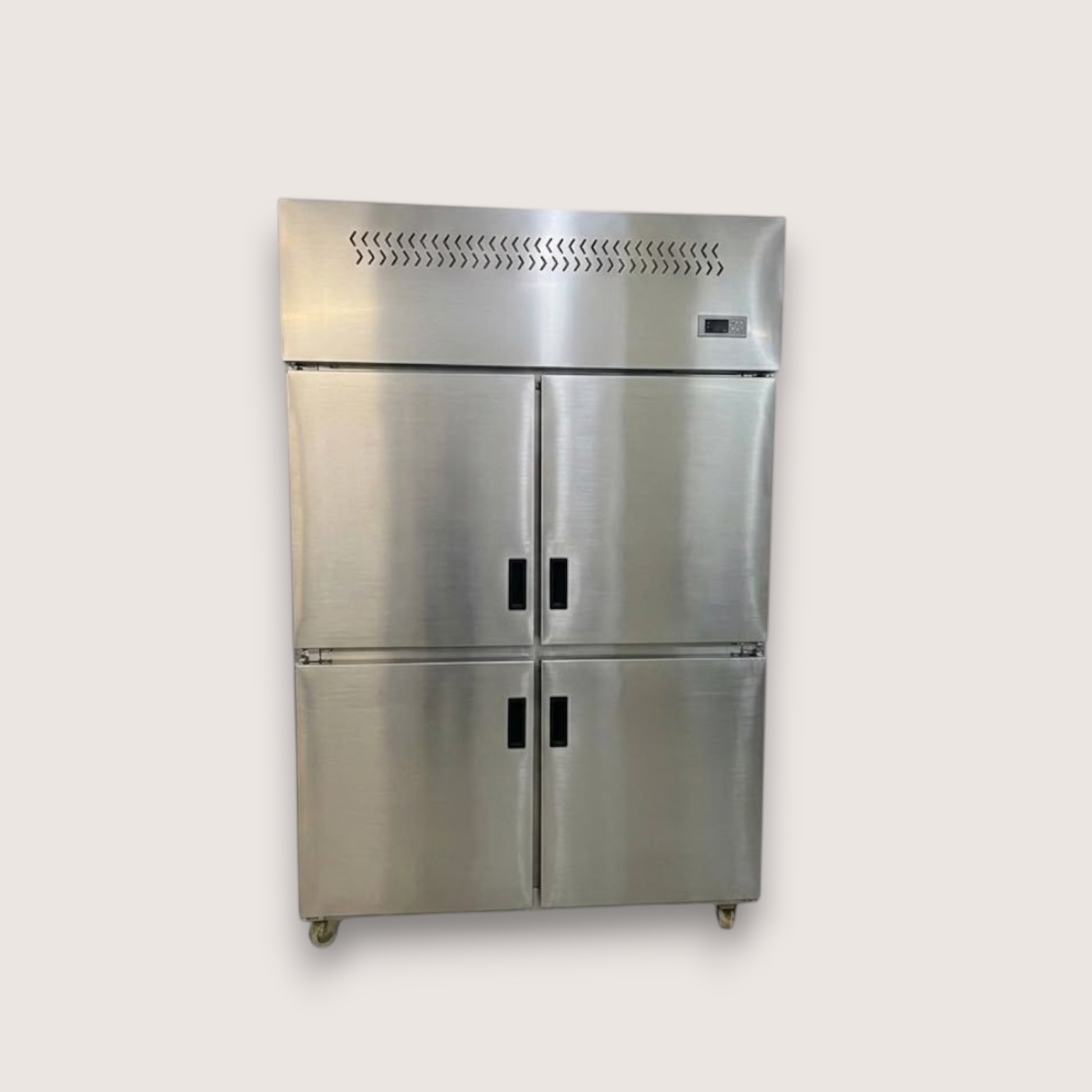 Four-door refrigerator with top-mounted unit